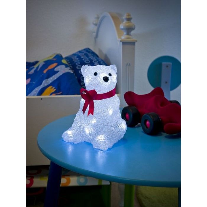 Świąteczny miś polarny LED, siedzący z czerwoną kokardą 18cm, na baterię, do wnętrz